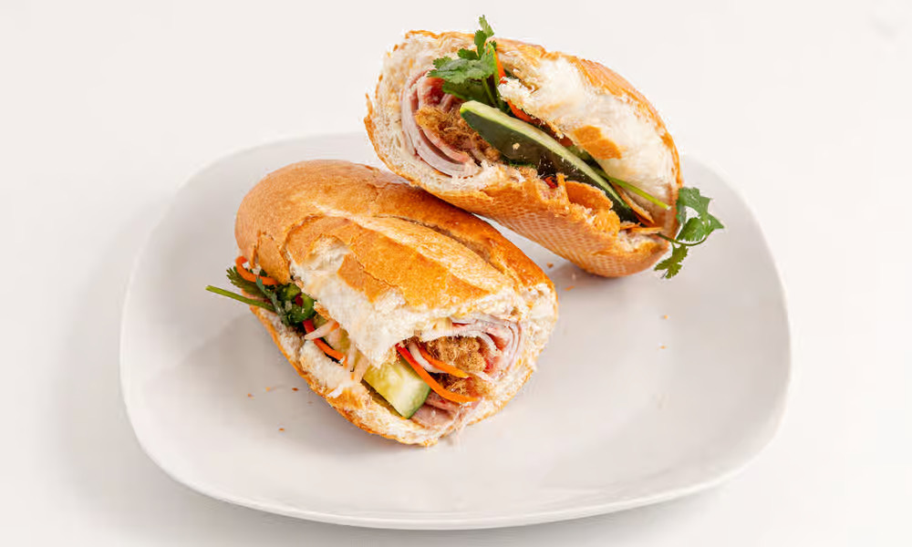 Saigon Special bánh mì from Banh Mi House, split open on a crackly baguette
